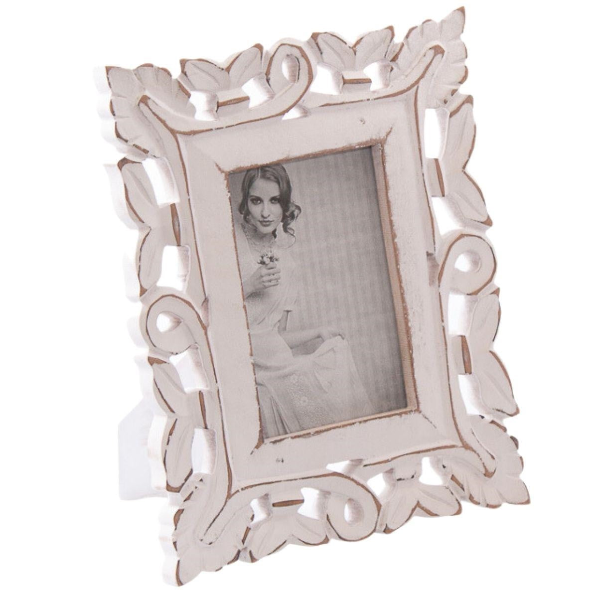 Portafoto in legno intagliato 22x27