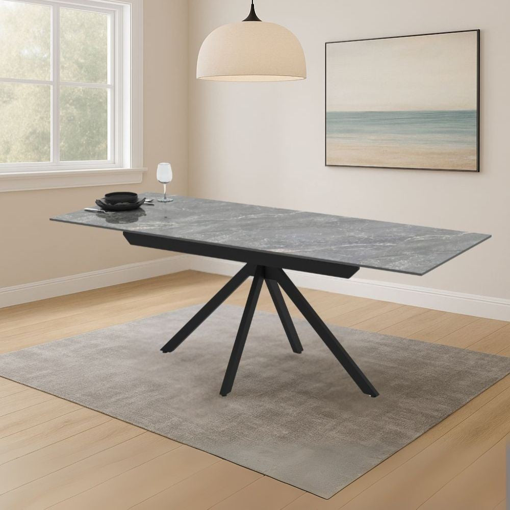 Tavolo allungabile Perla con piano in ceramica effetto marmo grigio e gambe in metallo nero