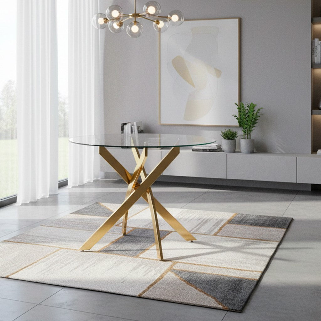 Tavolo da pranzo tondo fisso Peyton con piano in vetro temperato e gambe oro 100x100 cm.